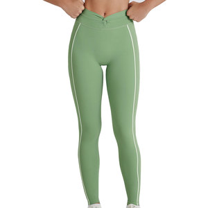 Leggings de yoga vert taille haute avec bande latérale, pantalon long sans couture en Spandex et Nylon, extensible dans les quatre sens, design à surpiqûres contrastées - Product Image 1