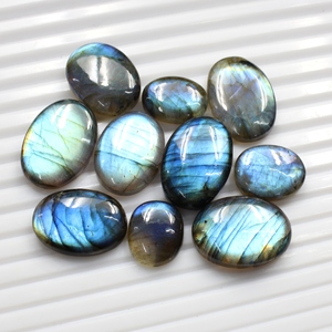 High Quality 10x14mm <b>Blue</b> Flashy Natural Sapphire Oval Cut Star Optical Effect Smooth Cabochon Loose Jewelry Making Wholesale - Product Image 1