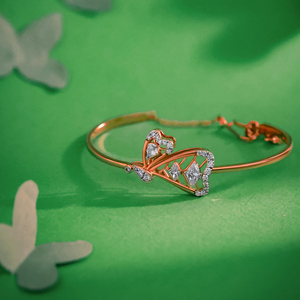 Elegant Rose Gold 18K <b>Bangle</b> <b>Bracelet</b> with Lab Grown Diamond Teardrop Gemstones Diamond Leaf Motifs Luxurious Pav Detailing - Product Image 3