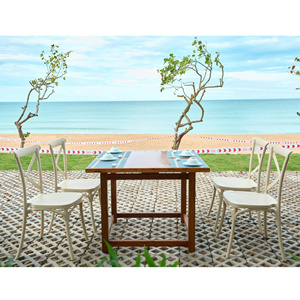 Chaise en plastique moulé de couleur beige, style X-Back, une chaise confortable et fiable pour des expériences culinaires. - Product Image 3