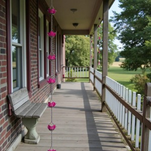 Chaînes de pluie florales roses faites à la main, idéales pour remplacer les tuyaux d'évacuation et diriger l'eau en douceur vers le sol ou dans un seau. - Product Image 4