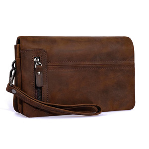Bolso de mano de cuero genuino con elegante artesanía, organizador compacto y diseño de cierre seguro para bodas, viajes y negocios. - Product Image 1