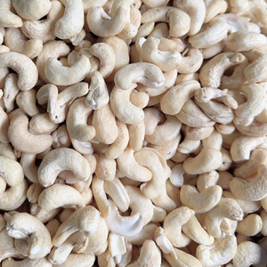 เม็ดมะม่วงหิมพานต์ดิบเวียดนามราคาถูก พร้อมส่ง จำนวนมาก ออร์แกนิค แบบเต็มเม็ด W320 W450 เม็ดมะม่วงหิมพานต์ซานติโก MOQ ต่ำ - Product Image 1