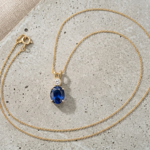 Collar con colgante ovalado azul chapado en oro con cadena de cuerda con piedra transparente redonda para mujer - Product Image 1
