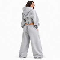 Ensemble coordonné personnalisé par le fabricant pour femme, comprenant un sweat à capuche court gris style corset et un pantalon de survêtement palazzo à jambe large en molleton épais