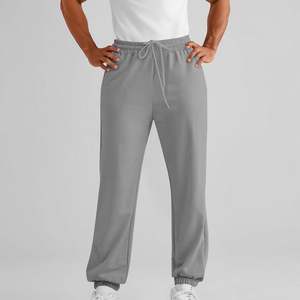 กางเกงขายาว OEM ระบายอากาศได้ดี มีกระเป๋า ผ้าฟลีซ แบบจ็อกเกอร์ มีเชือกผูก เอวยางยืด เหมาะสำหรับออกกำลังกาย วิ่ง และเล่นกีฬาสำหรับผู้ชาย - Product Image 5