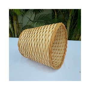 Eco-friendly round rattan <b>containers</b> for versatile use in hospitality and home decor - Product Image 5