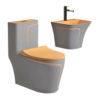 Ensemble WC monobloc noir de luxe et lavabo suspendu, WC en céramique à poser au sol avec ligne dorée pour salle de bain