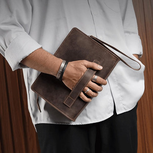 Bolso de mano de cuero genuino con costuras resistentes y compartimentos espaciosos, ideal para estilos de vida modernos a un precio razonable. - Product Image 2