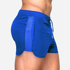 Short de sport pour hommes et garçons, avec détails réfléchissants, panneaux latéraux respirants, en polyester et élasthanne doux, idéal pour l'échauffement. - Product Image 3