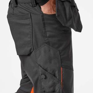 ชุดทำงานแบบใหม่สั่งทำได้ ชุดคลุมทำงานแบบยูนิเซ็กซ์ กระเป๋าแบบ Holster พิมพ์ลาย UV ผ่านการรับรองมาตรฐาน BS ผลิตจากผ้าฝ้าย ปี 2026 - Product Image 6