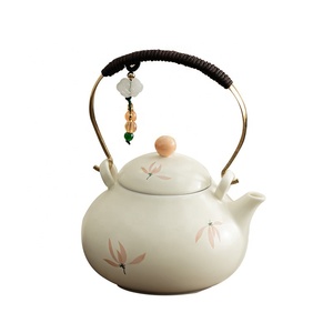 Set da Tè in Ceramica Orchid Wind Chime con Teiera Piccola e Due Tazze, Design Minimalista, Portatile per Esterni e Viaggi, Tazza a Rapida Utilizzazione - Product Image 5