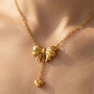 New Trendy Stainless Steel <b>Bow</b> Earrings and Necklace Set with Custom Packaging - Product Image 3
