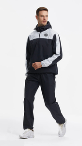 Survêtement coupe-vent pour homme avec blocs de couleur, pantalon de jogging sportif avec poches latérales, poids moyen, idéal pour l'automne - Product Image 1