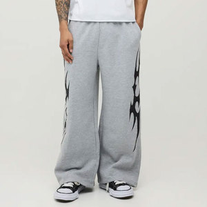 Pantalon de jogging gris pour homme avec taille élastique et bande latérale noire imprimée, coupe décontractée, en coton mi-lourd, idéal pour l'automne - Product Image 1