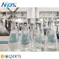 Ligne de production automatique 3-en-1 à grande vitesse pour bouteille en verre de jus de citron orange eau pétillante 500ml capacité boisson