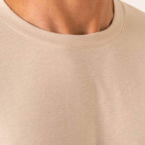 เสื้อยืดคอกลมทรงหลวมโอเวอร์ไซส์สำหรับผู้ชายรุ่นใหม่ ผ้าฝ้ายปักโลโก้ตามสั่ง ลายกราฟิก ฟิตเนส เป็นมิตรกับสิ่งแวดล้อม แห้งเร็ว - Product Image 5