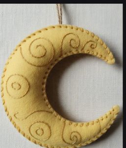 Handmade Textile Moon Ornament Traditional Craft Decor Yellow Felt With Embroidered Swirls Hanging Decoration - Product Image 1