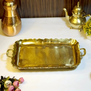 Le plateau de service, tendance et intemporel, apporte une valeur ajoutée précieuse à n'importe quelle maison. - Product Image 1
