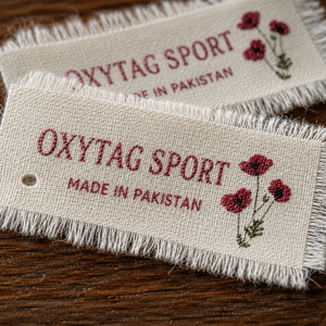 ป้ายผ้าปักลาย Oxytag Sport รูปทรงสี่เหลี่ยมผืนผ้า ผลิตในปากีสถาน รับผลิตตามสั่ง ขายส่ง ราคาถูก รับผลิตแบบ OEM - Product Image 1