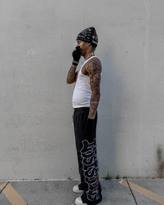 Pantalon de survêtement décontracté pour hommes 100% pantalon de survêtement en nylon broderie personnalisée sérigraphie logo coupe-vent léger coupe ample - Product Image 3