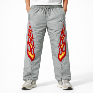 กางเกงแทร็คพิมพ์ลายเปลวไฟสีเหลือง สตรีทแวร์ จ็อกเกอร์ น้ำหนักเบา เอวยางยืด ผ้าไนลอน ผลิตตามสั่ง - Product Image 1