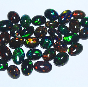 Ópalo Negro Etíope Natural Calibrado de 10*8mm, Gema de Ópalo en Forma Ovalada Cabujón con Juego de Color, Venta Directa de Fábrica al Por Mayor - Product Image 1