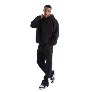 Conjunto Deportivo de Hombre con Capucha, Color Negro, Estilo Urbano, Corte Regular, Pantalones de Felpa de Algodón de Color Sólido, con Bolsillos Laterales, para Invierno - Product Image 1
