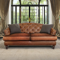 Canapé sectionnel extensible trois places Chesterfield moderne de style européen Blue Ocean, convertible, en cuir véritable, avec structure en bois pour villa