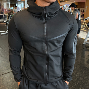 Veste de sport à capuche zippée pour homme, en softshell extensible de haute qualité, avec poches zippées, idéale pour la course à pied, la gym et l'entraînement. - Product Image 1