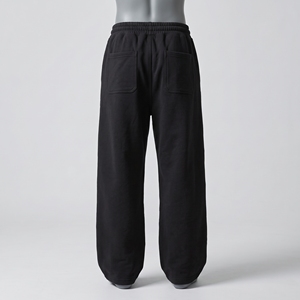 Pantalones de chándal oversize para hombre, negros, de pierna ancha, con bajo abierto, de forro polar, cintura elástica con cordón, bolsillos laterales, logo en la pierna, estilo baggy para jogging - Product Image 2