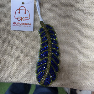 Colección al por mayor de amuletos para bolsos con cuentas hechos a mano estilo bohemio indio de Guru Kirpa Export House para colgantes de moda de aleación - Product Image 1