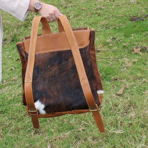 Premium cowhide leather hair on student <b>backpacks</b> wholesale supplier OEM custom handmade export quality leather school bags - Product Image 2