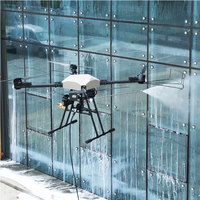 Drone de lavage de bâtiment le plus vendu Drone de nettoyage de panneau solaire de toit de fenêtres à haute pression