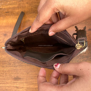 Nueva bolsa de maquillaje de viaje con cremallera de cuero de vaca a mano para mujer, bolso de mano con borla de cuero genuino de alta calidad - Product Image 6