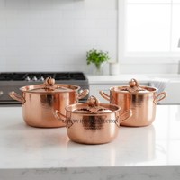 Casseroles Ruffoni de qualité supérieure en acier inoxydable texturé martelé, finition cuivre antique, avec poignées en forme de raisins dorés