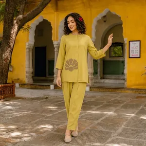 Ensemble Kurta brodé jaune moutarde pour femme, haut à manches longues à col rond, pantalon assorti, motif floral minimaliste, tenue ethnique décontractée - Product Image 5