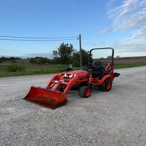 Tracteur Kubota BX23S prêt pour le travail agricole, la préparation du terrain, le creusement et le transport de matériaux, avec des performances polyvalentes. - Product Image 3