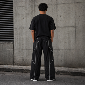 Pantalon de survêtement ample en polyester imperméable et coupe-vent pour homme, avec logo brodé personnalisé et passepoil tendance de haute qualité - Product Image 3