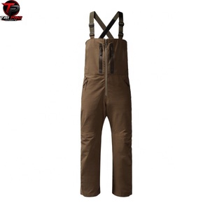 Salopette de chasse pour homme, couleur olive, avec fermeture éclair centrale intégrale, deux poches poitrine, bretelles croisées réglables, imperméable, pour l'hiver - Product Image 1
