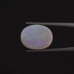 โอปอลสีขาวธรรมชาติ รับรองโดย IGI น้ำหนัก 5.87 กะรัต รูปทรงวงรี ขนาด 16x12.5 มม. ตัดด้วยมือ ขัดเงา ผ่านการเคลือบแว็กซ์/น้ำมัน คุณภาพดี - Product Image 1