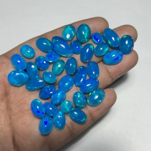 โอปอลธรรมชาติคุณภาพพรีเมียม รูปทรงวงรี โอปอลเวโลแท้ แบบคาโบชอง หลายสี ไพรบา บลูไฟ โอปอลหลวมสำหรับทำเครื่องประดับ - Product Image 3