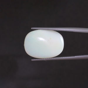 โอปอลสีขาวธรรมชาติ พลอยหลวม 9.01 กะรัต รูปทรงวงรี 20x14 มม. รับรองโดย IGI ขัดเงาด้วยมือ ลงแว็กซ์/น้ำมัน ขายส่งราคาเบาๆ - Product Image 3