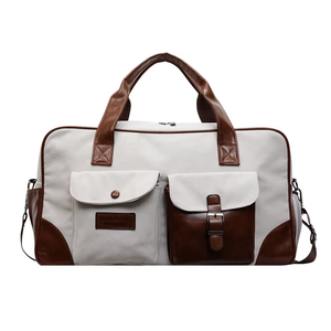 Sac de voyage en toile blanc cassé avec garniture en cuir, multi-poches, sac de week-end robuste - Product Image 1