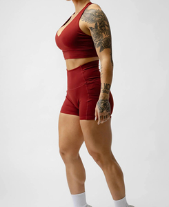 Ensemble de yoga 2 pièces rouge uni pour femme, avec bretelles croisées, short taille mi-haute, fermeture éclair avant, sans couture, en Spandex et Polyester, anti-transpiration - Product Image 1