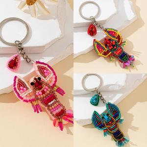 Porte-clés décoratif fait main avec broderie perlée, combinaison de couleurs vibrantes et travail de broderie traditionnel complexe - Product Image 6