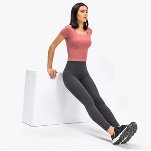 Wholesale Elastic Soft Skin Seamless Mid Waist Butt Lift Leggings <b>Tight</b> Yoga Pants for Women with Pockets - Product Image 4