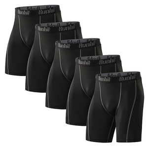 Shorts de basketball ajustés personnalisés pour jeunes et adultes, en polyester/spandex, avec cordon de serrage, couleur unie, séchage rapide, couche de base, taille très élastique - Product Image 1
