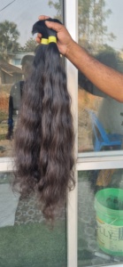 Extensiones de cabello humano virgen negro de alta calidad Cabello de grado de templo indio crudo dibujado solo Remy ondulado natural - Product Image 5