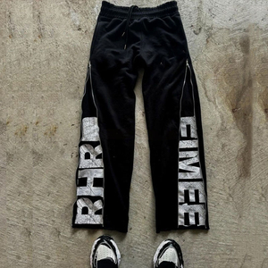 Pantalon ample imprimé pour homme avec demi-fermeture éclair, style streetwear, coupe décontractée avec fermeture éclair graphique dissimulée, mode décontractée - Product Image 2